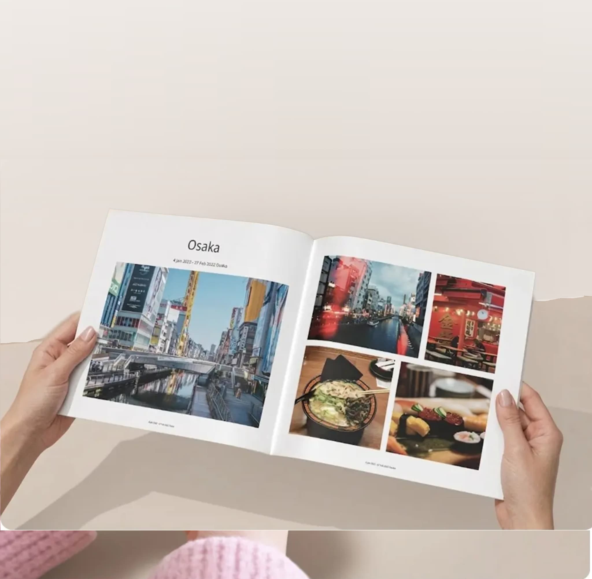 An open Lumashot photo book being held in both hands